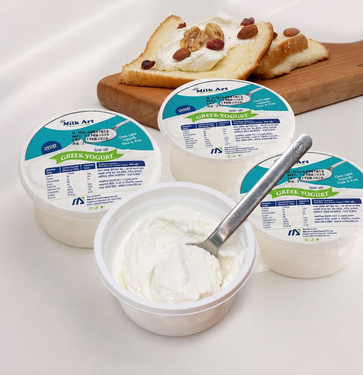 Plain Greek Yogurt in a white container